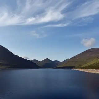 The Silent Valley reservoir with steep Mourne slopes rising on both sides