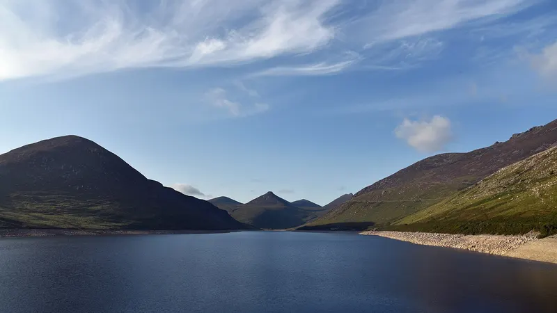 The Silent Valley reservoir with steep Mourne slopes rising on both sides
