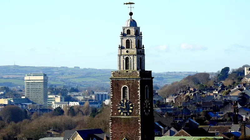 The red and white steeple of St Anne's Church, Shandon, above the city