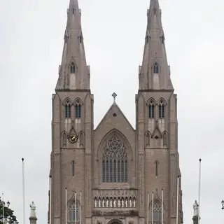 The twin spires of St Patrick's Catholic Cathedral in Armagh above a long flight of steps
