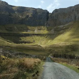 The Gleniff Horseshoe road running into the valley under its limestone cliffs