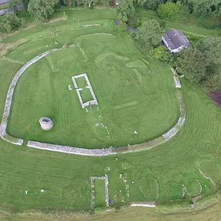 Aerial view of the rings of stone walls and the round tower stump at Nendrum on Mahee Island