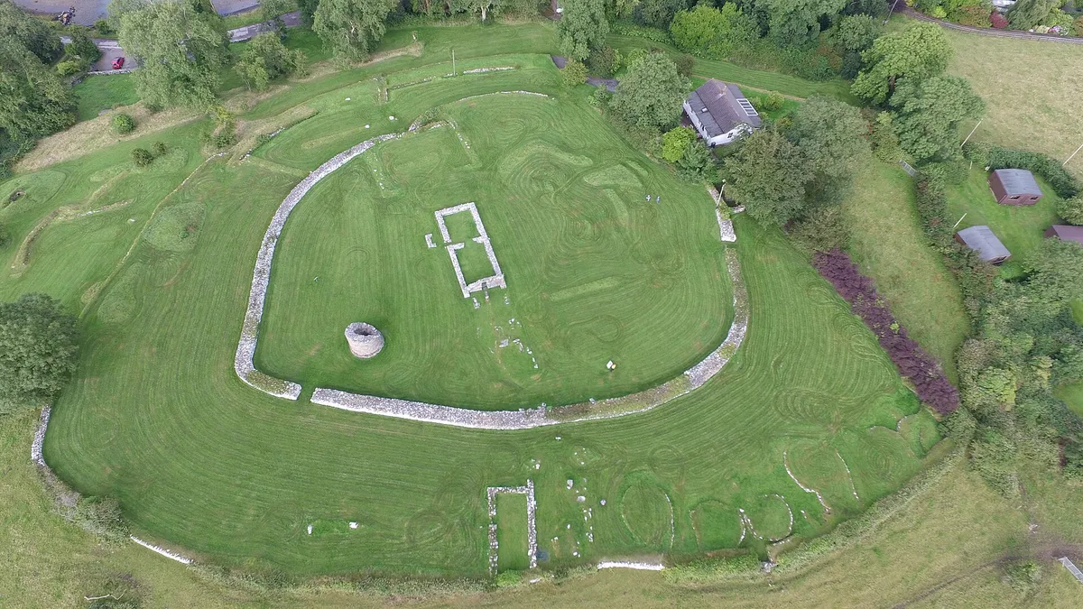 Aerial view of the rings of stone walls and the round tower stump at Nendrum on Mahee Island