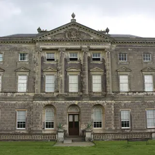 The classical stone entrance front of Castle Ward house