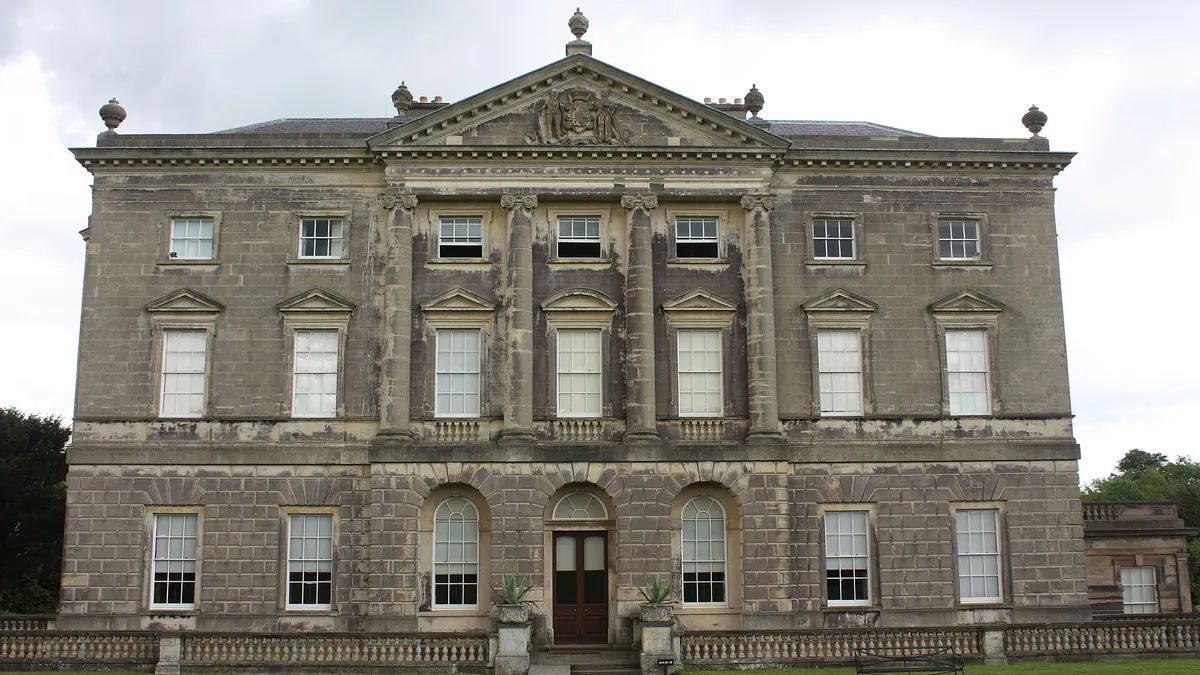 The classical stone entrance front of Castle Ward house