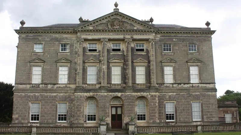 The classical stone entrance front of Castle Ward house