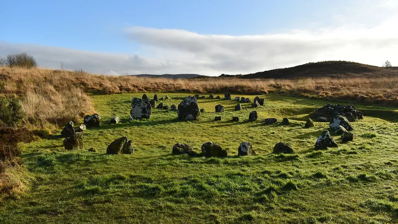 The stone circles and cairns at Beaghmore laid out across open moorland, with low hills behind