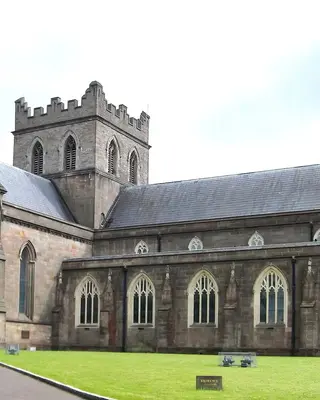St Patrick's Church of Ireland Cathedral in Armagh, a long sandstone church with a square central tower