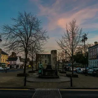 The square in Newcastle West at dusk, by the Desmond Castle